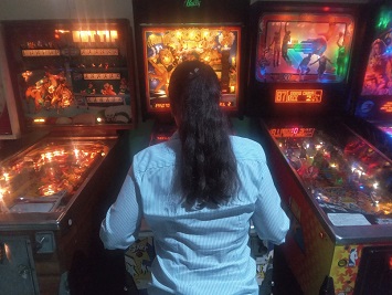 4-pinball-machines-and-pretty-girl.-Richard-Blank-Costa-Rica-Collection.jpg